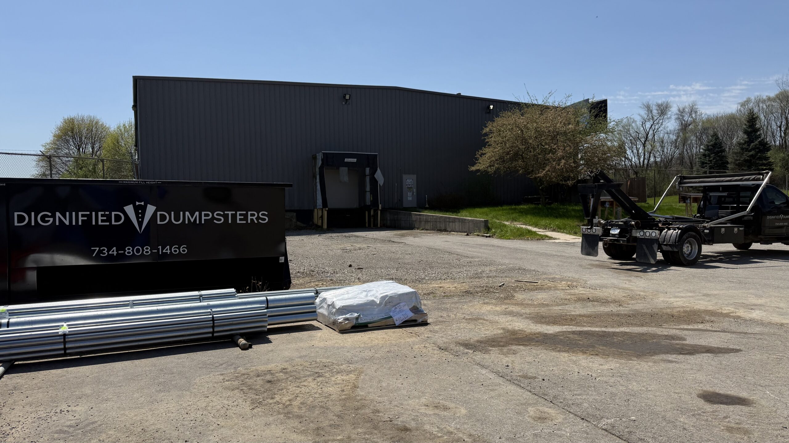 Construction dumpster rental on a residential remodeling project in Michigan