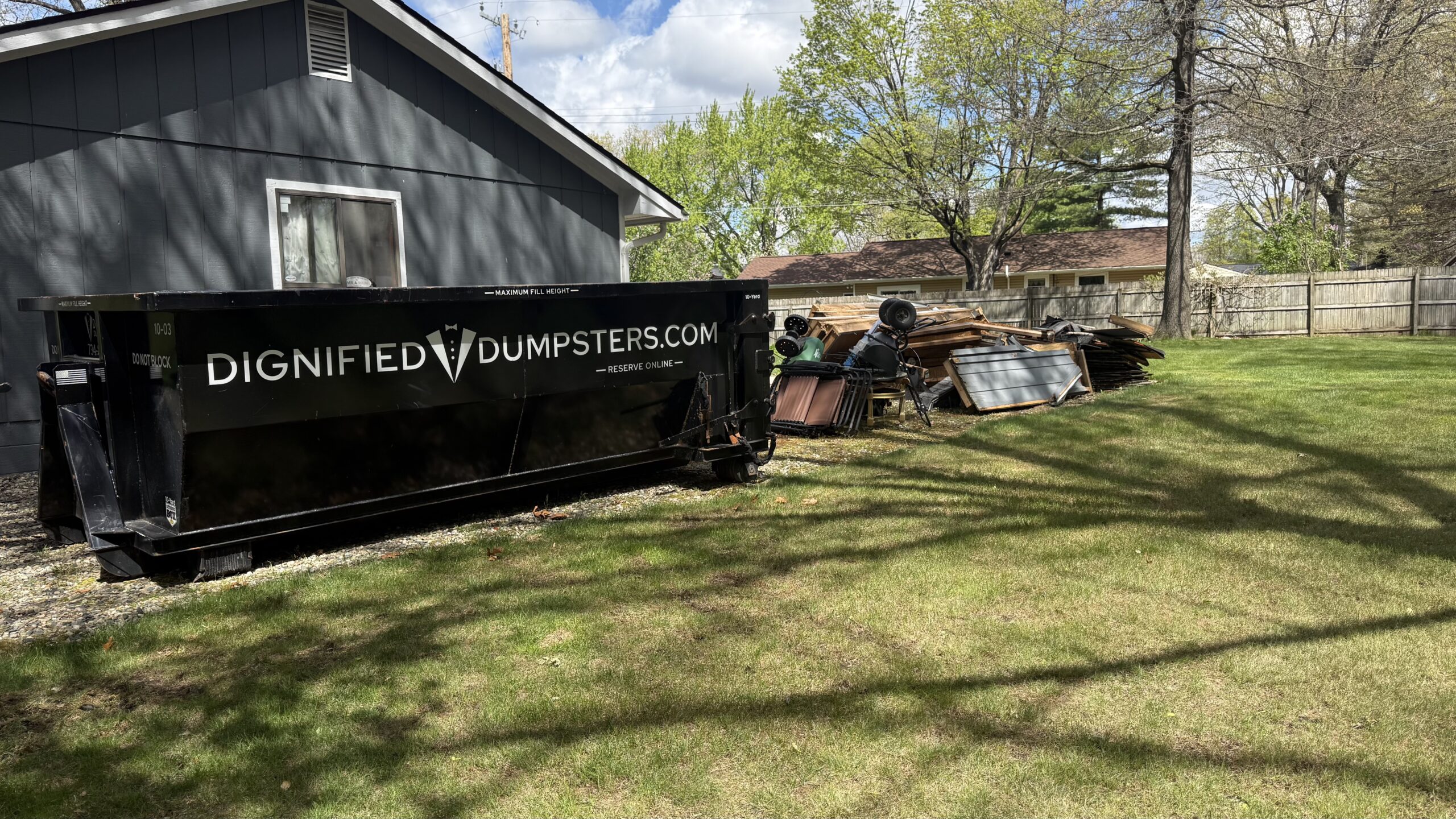 Garage Cleanout Dumpster Guide (Ann Arbor & Brighton MI) | Sizes, Costs & Tips